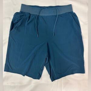 LULULEMON ATHLETICA TEAL ATHLETIC SHORT WITH A POCKET IN THE SIDE SIZE M